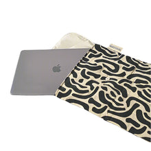 画像をギャラリービューアに読み込む, Product photo of fabric latop pouch, flat open to show laptop fitting. Black and beige abstract print