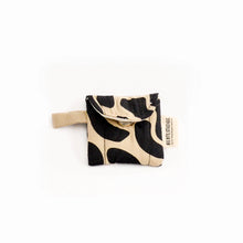 Load image into Gallery viewer, A collection of puffy AirPod cases in various designs and colors, displayed alongside a pair of AirPods.