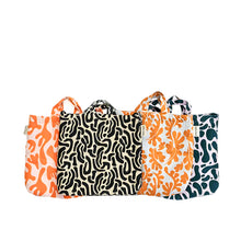 Cargar imagen en el visor de la galería, product photo for puffy fabric tote bags. Four bags each in bright abstract print