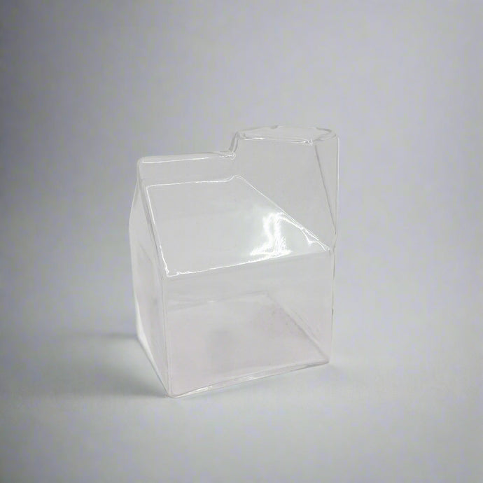 Product photo of a glass milk carton