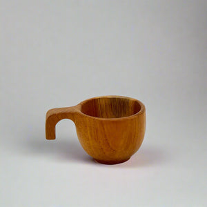 Product photo of small round wooden cup with a hook style handle