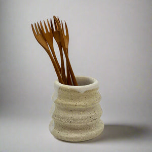 Product photo of long handled wooden forks, multipal forks in a ceramic vase