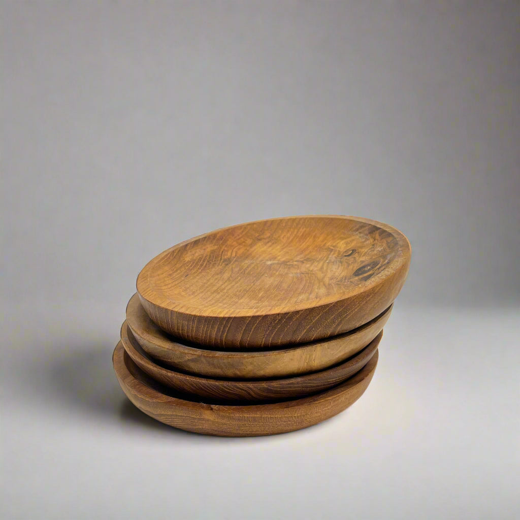 Product photo of four wooden plates in a stack