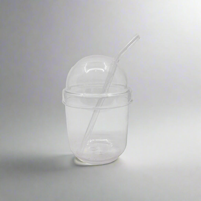 Product photo of milkshake cup, glass with glass dome lid and straw