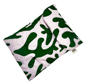 Product photo of fabric Ipad pouch. Pastel prink and dark green abstract print