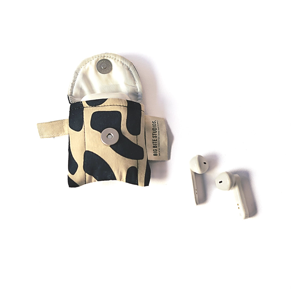 A collection of puffy AirPod cases in various designs and colors, displayed alongside a pair of AirPods.
